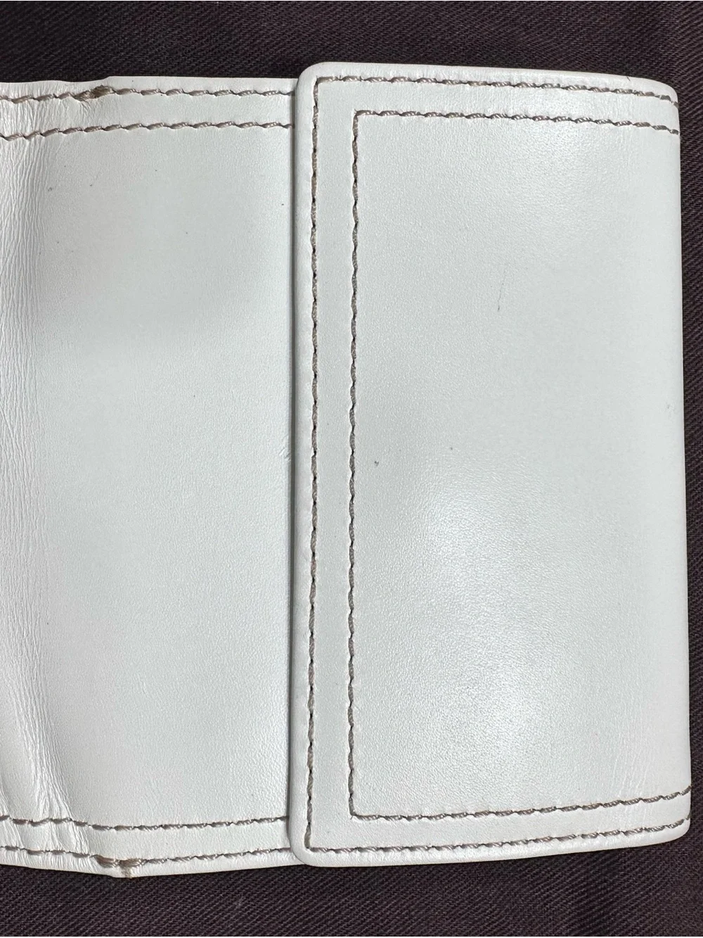 COACH White Leather Fold Wallet with Signature Metal Accent